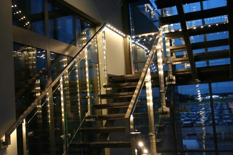 led illuminated balustrade by the stairs in the office building