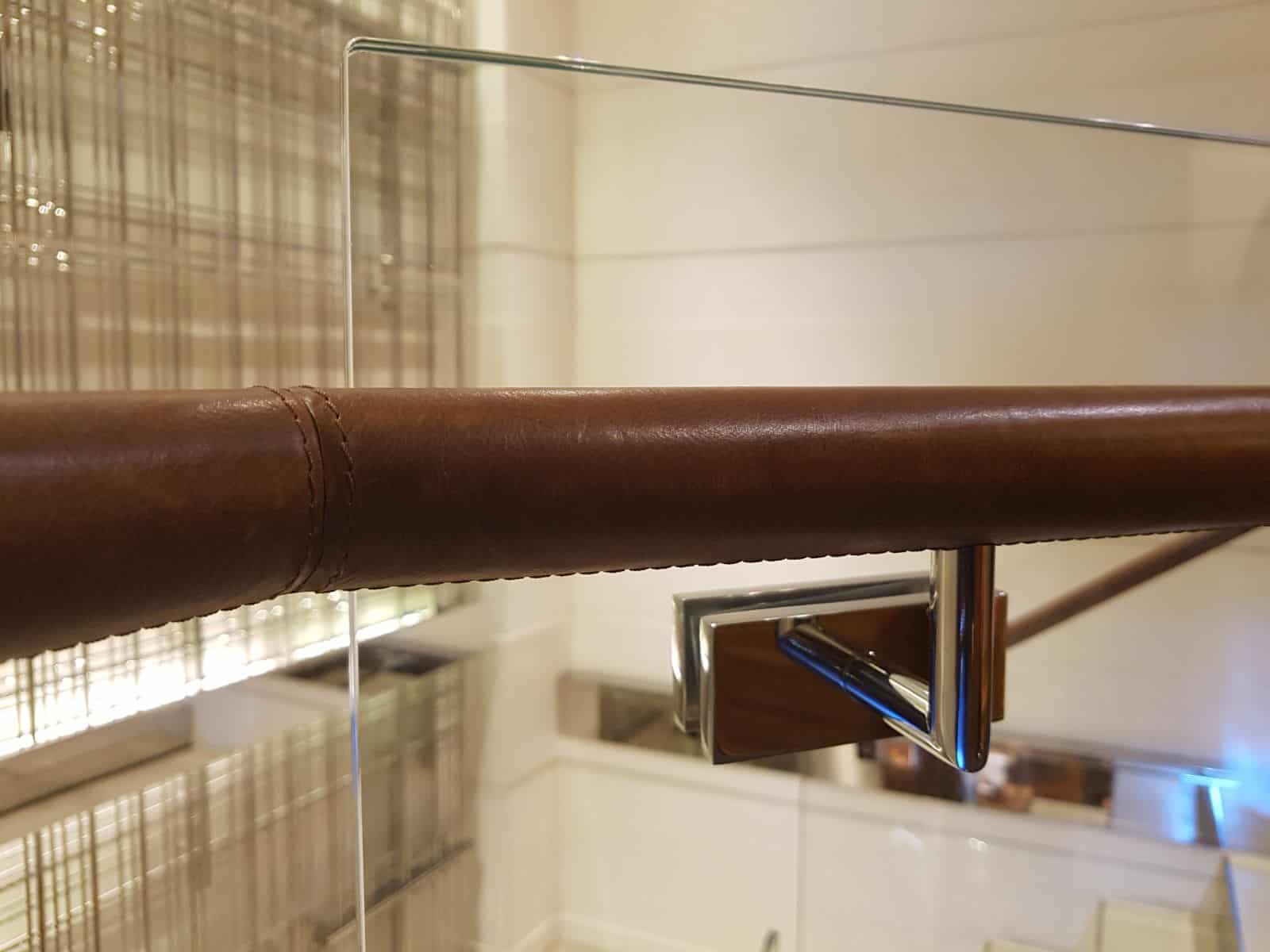 brown leather wrapped handrails